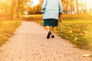 senior woman walking outside